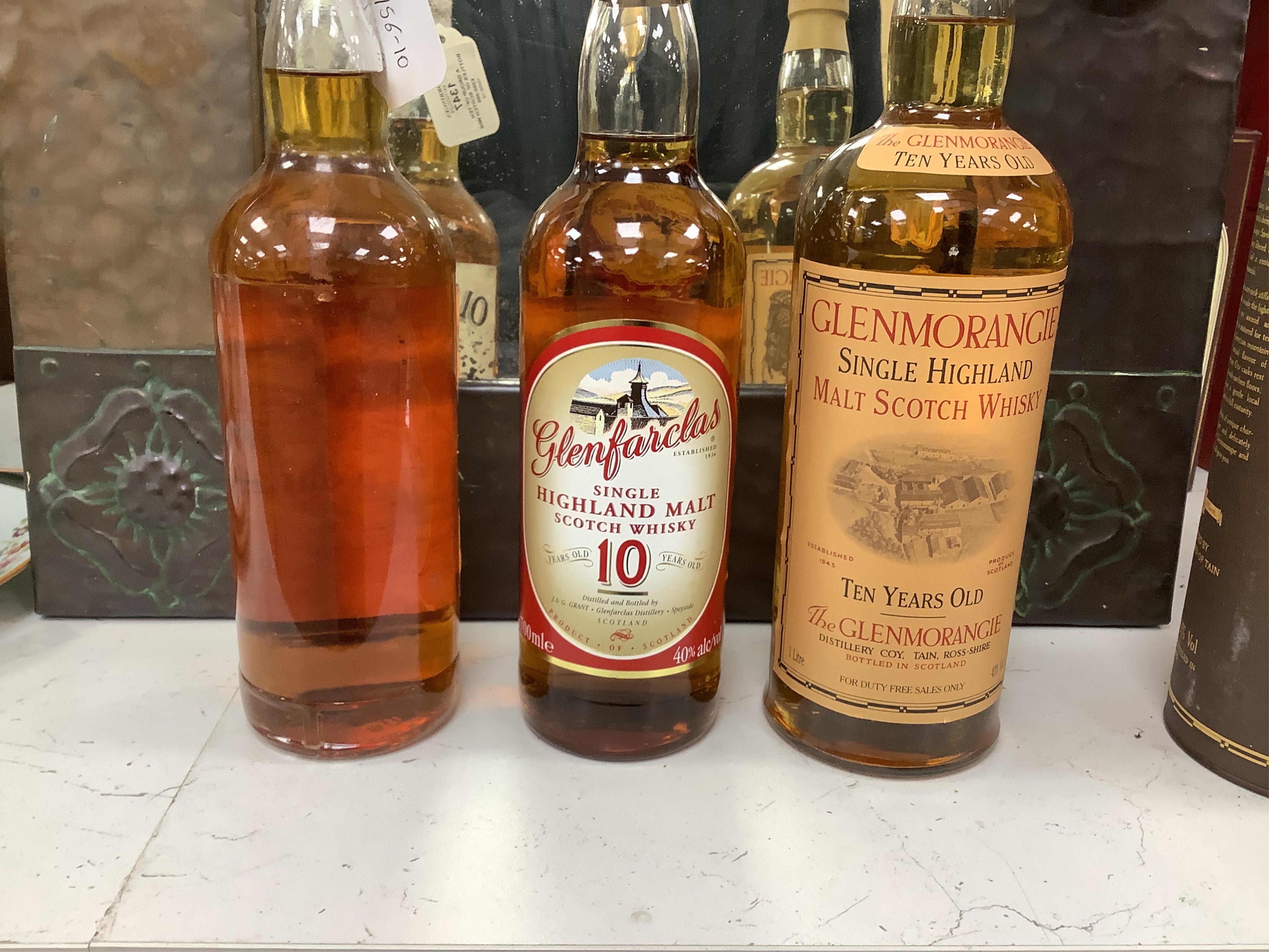 A group of ten bottles of Scotch Whisky; Glenfiddich Pure Malt Special Reserve 1 litre x2, Glenmorangie ten year 1litre, Glenlivet 12 year 70cl, Macdonalds Glencoe 8 year 70cl, The Famouse Grouse 10 year 70cl, John Hopki